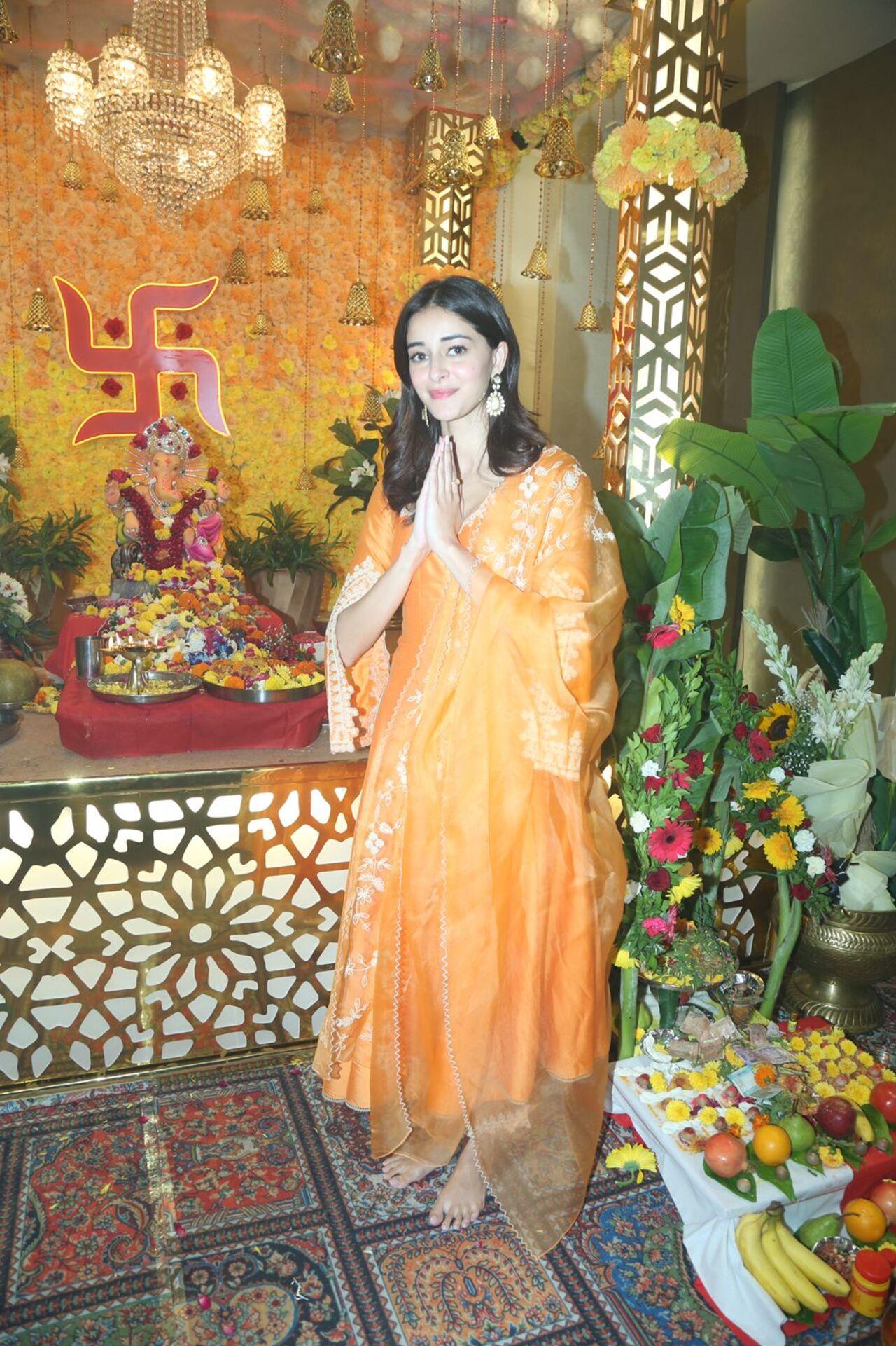 Ananya looked pretty in an orange-coloured kurta-pyjama suit